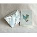 For gift giving a blank note card with envelope is included